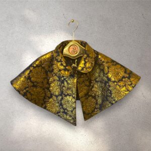 The Capelet reversable navy/gold french jacquard