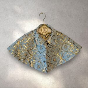 The Capelet reversable light blue & gold damask pattern